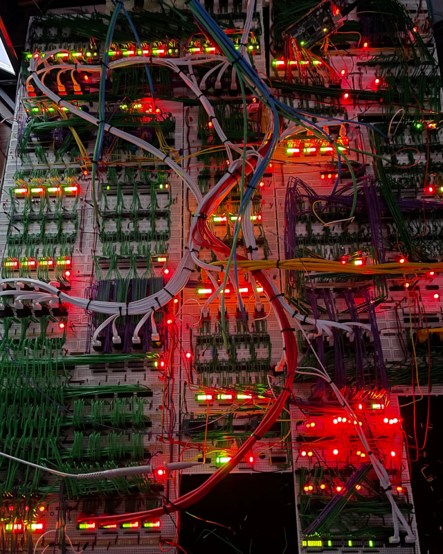 A breadboard full of chips and wires implementing a RISC-V CPU